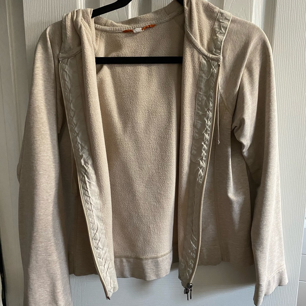 Beige J. Crew zip up jacket.